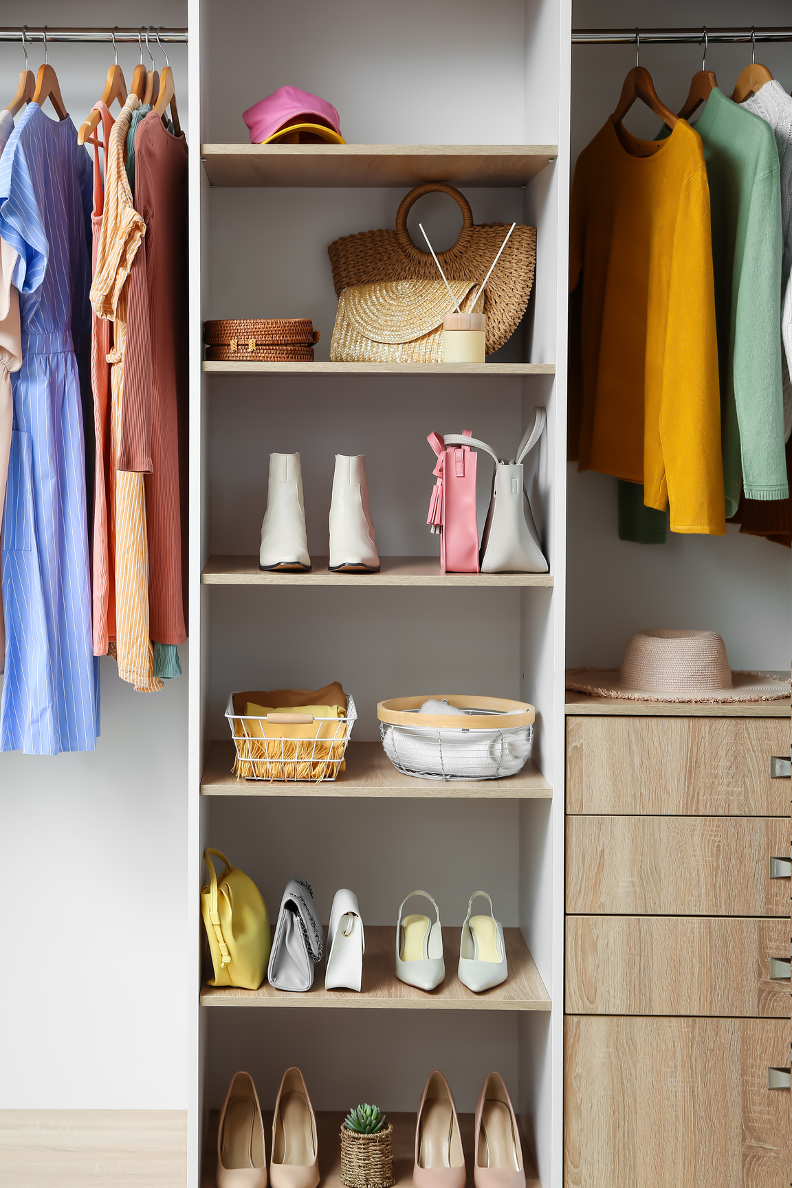 Modern Wardrobe with Clothes and Organizers in Room